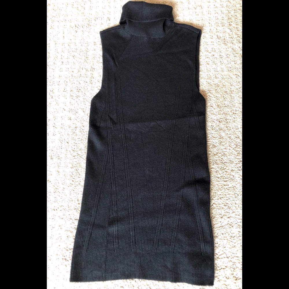 Sleeveless black turtleneck sweater